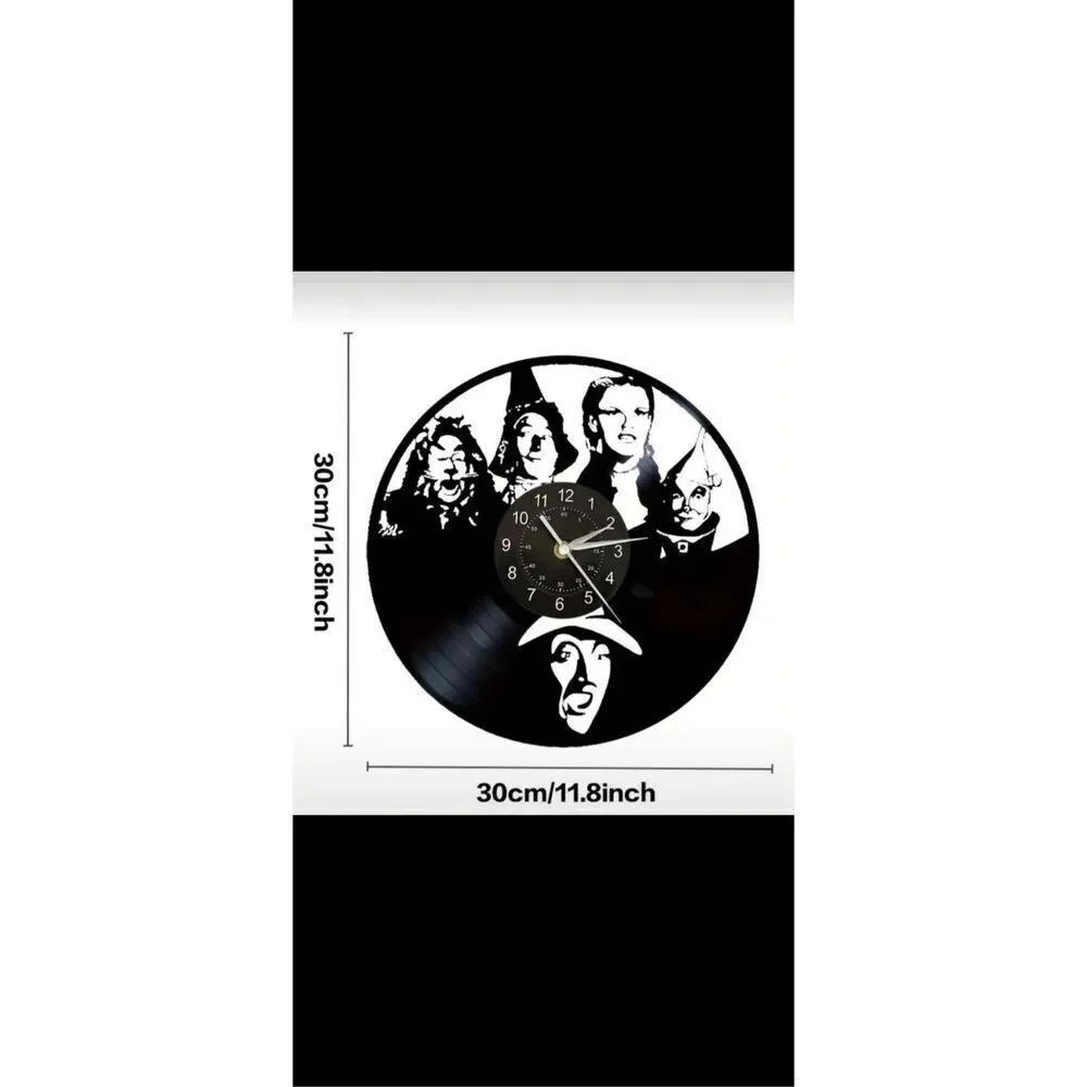 Wizard of Oz black metal clock aprox 12” in diameter